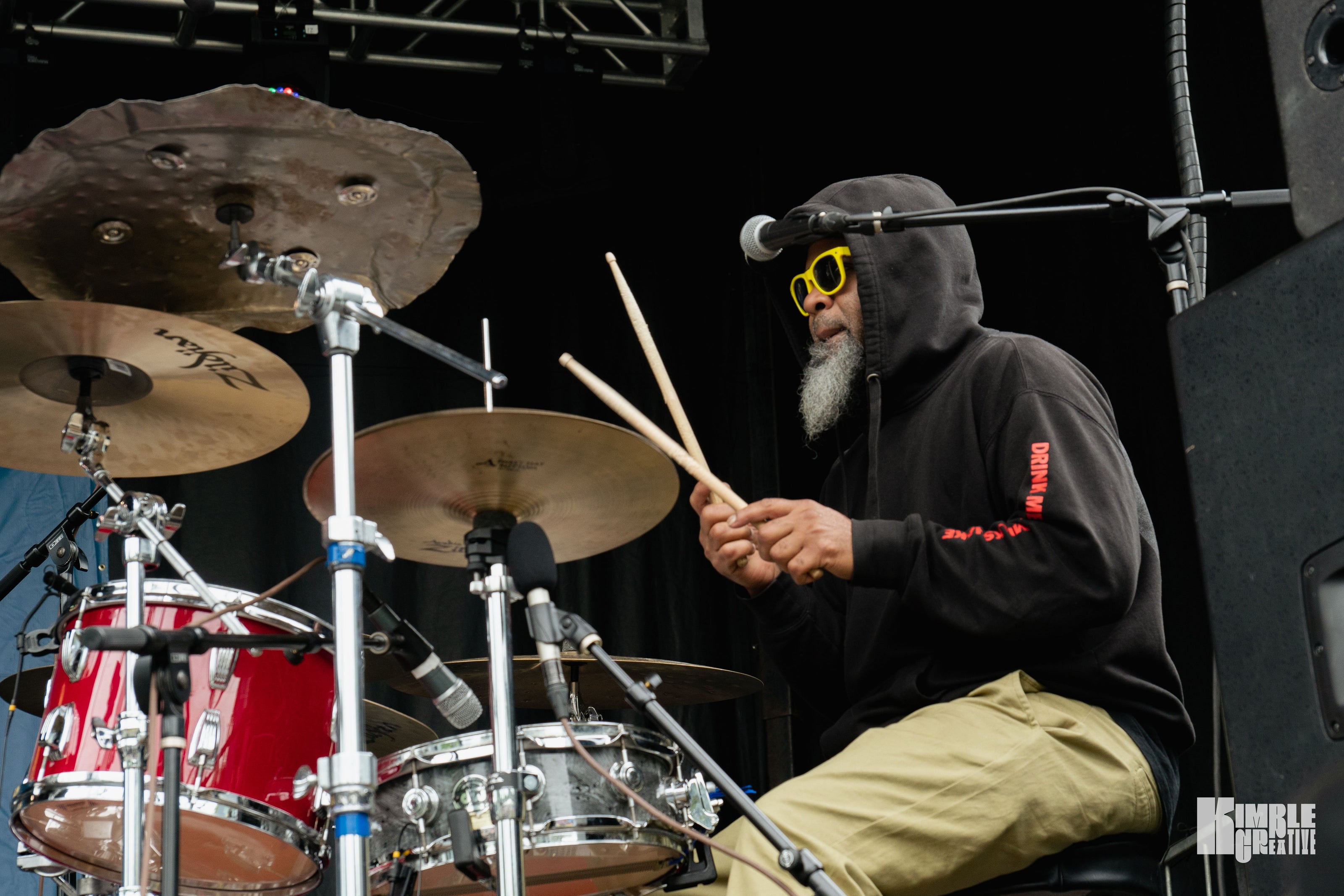 Iajhi Hampden looking cool while he plays the drums at an Isaac Hadden Organ Trio show.